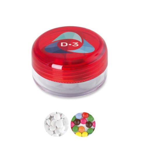 Kerek műanyag tégely mentolos cukorkával vagy édességgel.